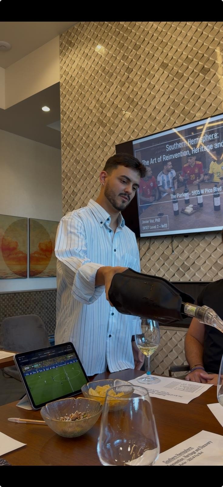 Wine being poured during a guided tasting experience